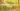 Seasonal Italian produce arranged on a rustic wooden table, fresh vegetables and fruits, warm sunlight, authentic Italian countryside vibe, realistic.